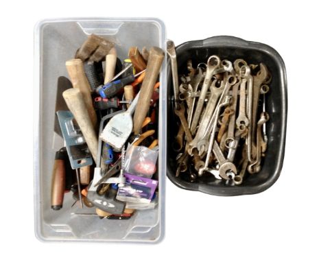 Two plastic tubs containing a large quantity of assorted hand tools and spanners.