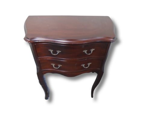A continental serpentine fronted two drawer commode chest, width 60 cm height 65 cm