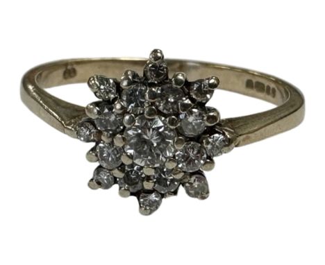 A 9ct gold diamond set cluster ring, size O.  CONDITION REPORT: 2.3g