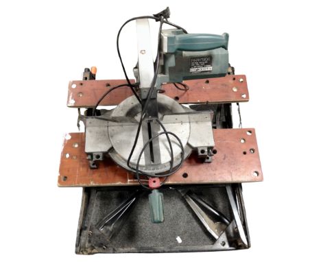 A Parkside chop saw together with a folding tool bench.