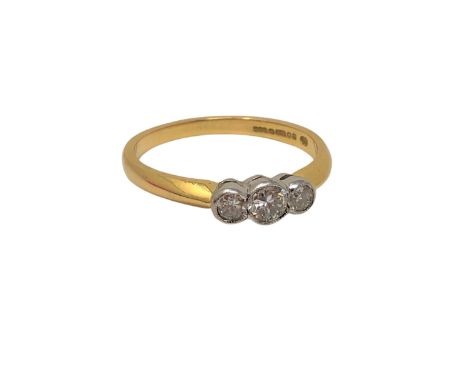 An 18ct gold three stone diamond ring, stated total diamond weight .43 carat, size Q CONDITION REPORT: 3.1g