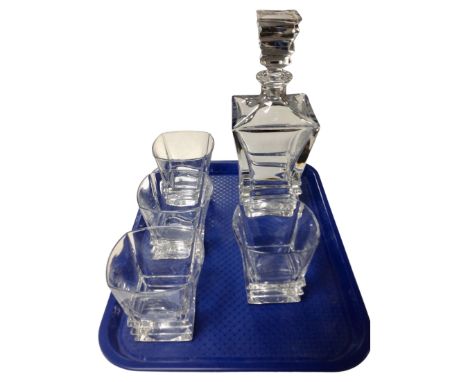 A square crystal whisky decanter together with a set of four matching glasses.
