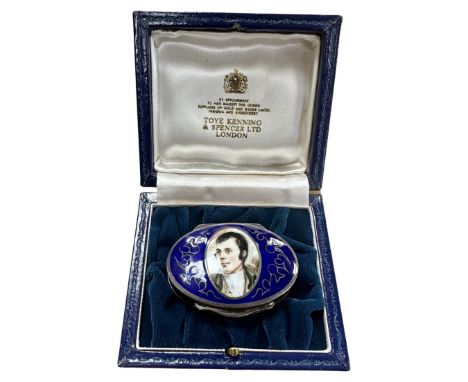 A silver and enamel pill box depicting Robert Burns, by Toye Kenning &amp; Spencer Ltd, London, boxed. 