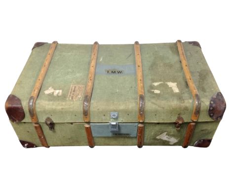 A bentwood canvas travelling trunk 
