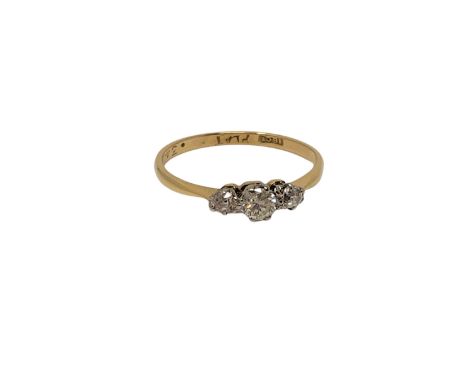 An 18ct gold three stone diamond ring, size O CONDITION REPORT: 1.8g