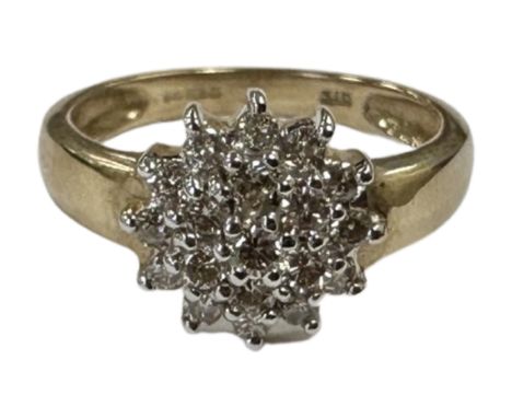 A 9ct gold diamond set cluster ring, size M.  CONDITION REPORT: 2.6g