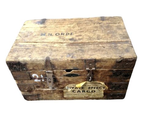 A 19th century metal bound pine shipping trunk.