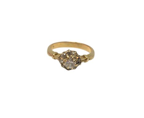 An 18ct gold diamond cluster ring, centre stone approx. 0.2 carat, size I CONDITION REPORT: 2.5g