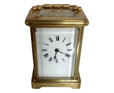 A brass cased French carriage clock.