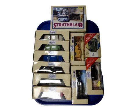A tray containing 11 Corgi die cast cars, delivery vans and busses. (boxed)