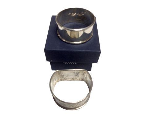 A Carr's silver napkin ring (boxed) together with a further silver napkin ring.