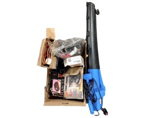 A garden vacuum together with a box containing power tools, a charging station, plasterer's trowel pack etc.