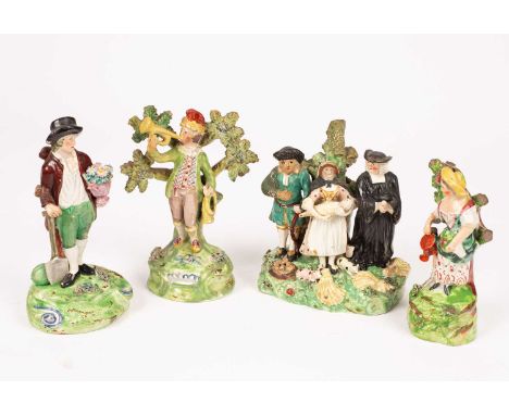 Two Walton pearlware figures of a bugler and a gardener, another of a lady gardener and a Tithe Pig group, early 19th Century