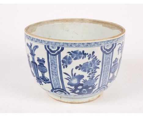 A Chinese blue and white bowl, Qing dynasty, late Kangxi period, of circular form, (lacking cover), decorated alternating pan