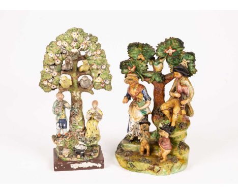 A Staffordshire pearlware bocage group, circa 1820, boy and girl figures below a tree of perching birds and nests of eggs , 2