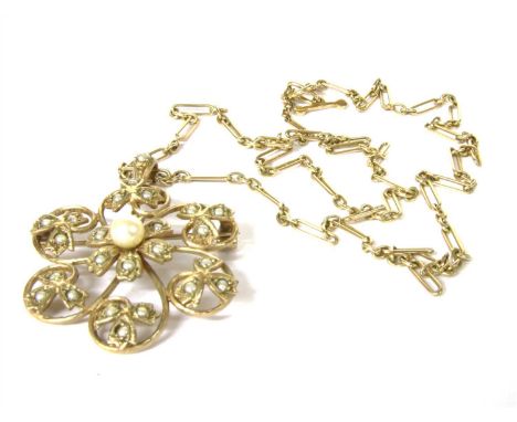 A split pearl and 9ct gold flower head pendant on chain, the central flower head surrounded by scrolling leaves, all set with