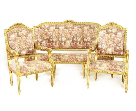 A Louis XVI giltwood salon suite, comprising a sofa, and two open armchairs, with floral carved giltwood frames, the sofa mea