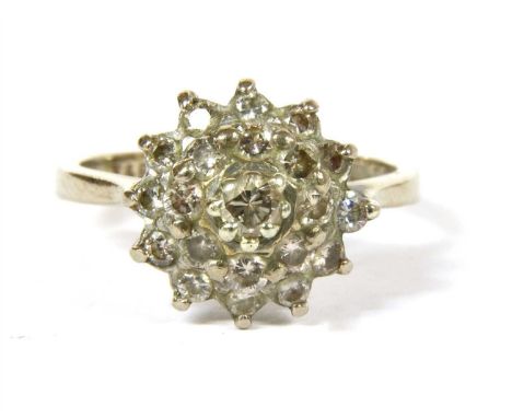 An 18ct white gold three tier diamond cluster ring, London 1977, 4.82g, size J