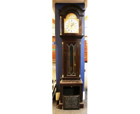 An Edwardian mahogany musical long case clock, the brass dial with a silvered chapter ring, the three-train movement with str