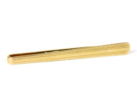 A 9ct gold tie slide, with engine turned decoration, 7.97g