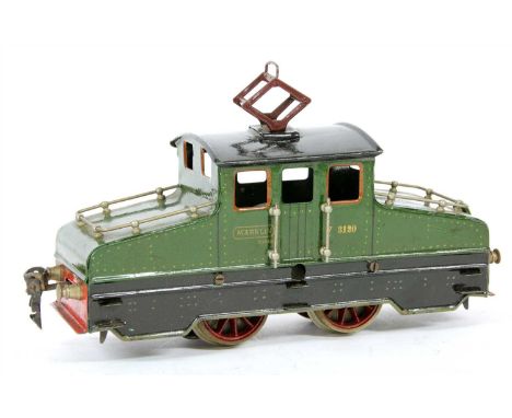 A Marklin O gauge electric locomotive, comprising two centre-cab 0-4-0 electrics