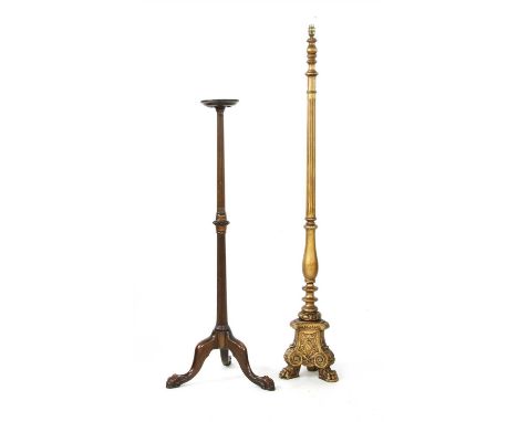 A reeded mahogany torchere, on a tripod base with claw feet, together with a rococo style gilt standard lamp
