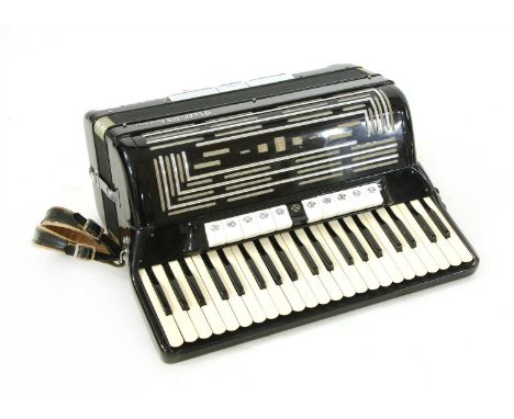 A Bell virtuoso cased accordion