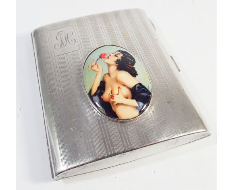 Hallmarked silver cigarette case with engine turned decoration and applied oval risque enamel panel to the top