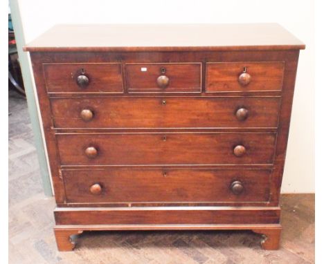 4' Victorian mahogany chest of 3 long and 3 short drawers with bun handles standing on bracket feet 