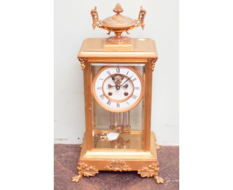 French 4 glass panel 8 day striking mantel clock with four glazed panels in a gilt brass case, stamped GP Wehlen & Co. 19" ta