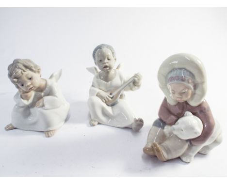 2 Lladro angel cherub figures and an Eskimo cuddling a polar bear  Mandolin playing cherub has detached wing