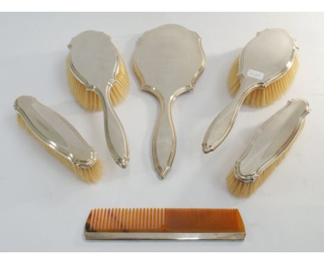 6 piece hallmarked silver backed dressing table set comprising hand mirror, four brushes and a comb