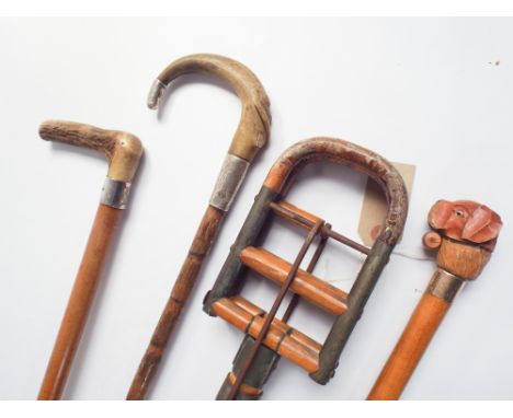 Bamboo shooting stick, 2 silver mounted walking sticks and one other 