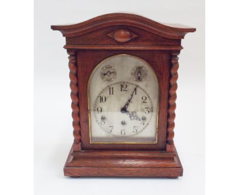 Edwardian chiming bracket clock with arch silver dial in oak case with barley twist columns