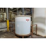 Vertical Poly Tank, Flat Bottom, Approx 3 ft dia x 4 ft tall for cap, Last used, Rigging Fee: $500