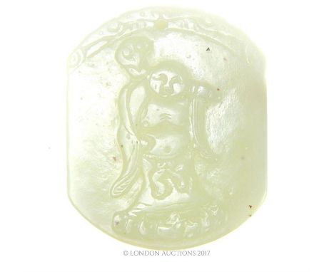 A Chinese Celadon jade pendant, carved with Buddha to one side, 5 x 4.5cm.
