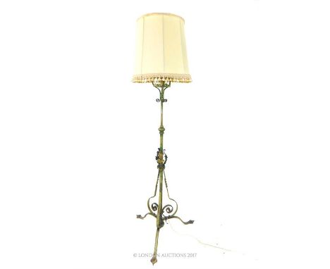 A painted wrought iron standard lamp, with a shade, 180 x 61 x 61cm.