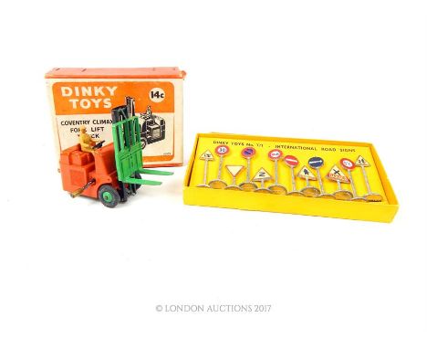 A Dinky Toys Coventry Climax Fork Lift Truck, with driver and original box together with a Dinky Toys set No. 771 Internation