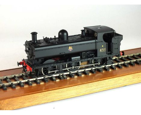 An O-gauge, scratch-built model of a BR steam locomotive, '5717', 0-6-0, in black livery, with a British Railways logo of a l