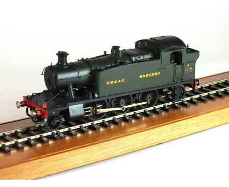 An O-gauge, scratch-built model of a GWR steam locomotive, '5572', 2-6-2, in green and black livery, locomotive built and pai