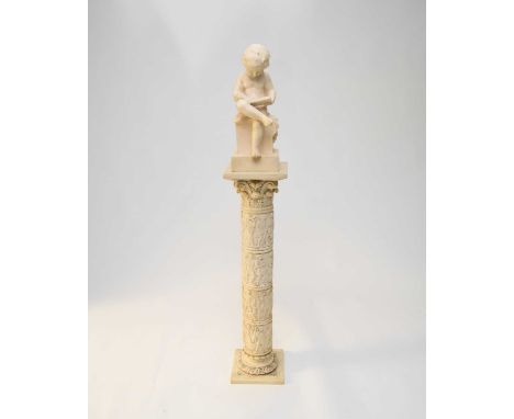 A resin model of a child reading a book, 46cm high, on a resin pedestal in the form of a corinthian pedestal with bands of mo