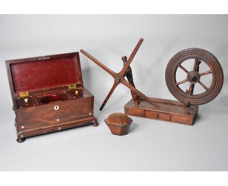 A Victorian tea caddy, part of a lace-maker's bobbin winder, wrongly assembled and incomplete, and a pin cushion, the tea cad