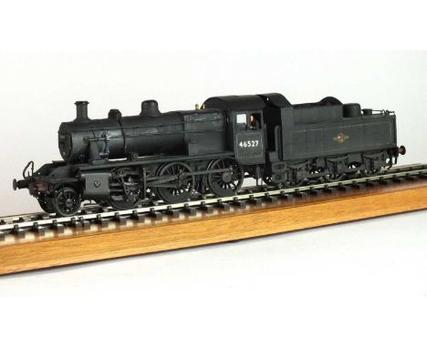 An O-gauge scratch-built model steam locomotive '46527', 2-6-0, in black livery, with a tender decorated with the British Rai
