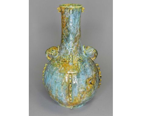 An unusual Royal Worcester Aesthetic Movement vasecirca 1875of elephant twin-handled form, decorated in mottled pale blue and
