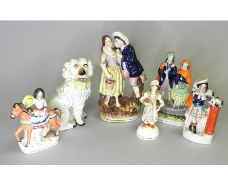 A group of six Staffordshire figures, circa 1860-80, comprising spaniel clutching basket of flowers, 21.5cm high; a woman sea