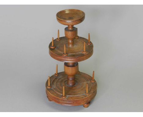 A Victorian whitewood cotton reel stand, possibly ash, the dish top above a buluster support with two tiers, on turned feet, 