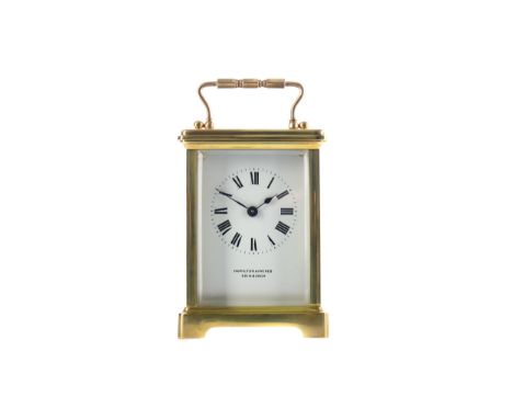 EARLY 20TH CENTURY CARRIAGE CLOCK, By Hamilton &amp; Inches, with white enamel Roman numeral dial, the brass five glass case 