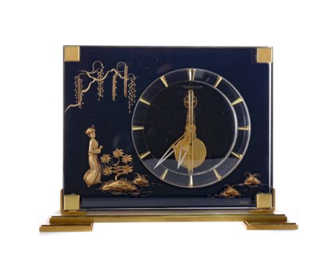 JAEGAR LE COULTRE MARINA MANTEL CLOCK, with eight day skeleton movement, the lucite dial with gilt chapter markers, decorated