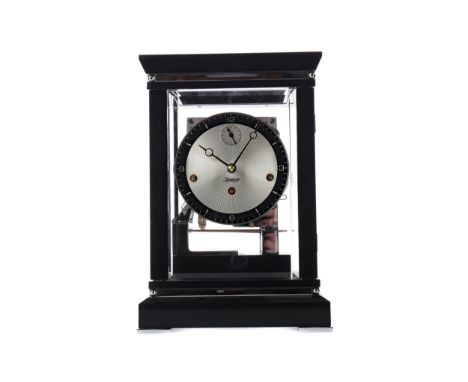 CONTEMPORARY KIENINGER MANTEL CLOCK, with three train eight day movement striking on eight gongs, the silvered dial with blac