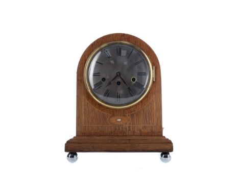 EARLY 20TH CENTURY OAK MANTEL CLOCK, the three train eight day movement by Junghans, with musical chime striking on four gong
